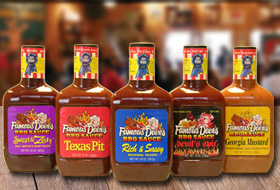 Five of Famous Dave's BBQ Sauces lined up 
